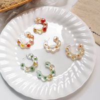 Nihaojewelry Wholesale Jewelry Retro C-shaped Transparent Flower Acrylic Earrings main image 1