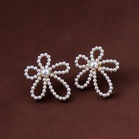 Wholesale Jewelry Hollow Flower Diamond Pearl Earrings Nihaojewelry main image 1