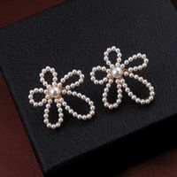 Wholesale Jewelry Hollow Flower Diamond Pearl Earrings Nihaojewelry main image 4