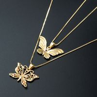 Nihaojewelry Bijoux En Gros Créatif Pendentif Papillon Creux Collier De Zircon Incrusté De Cuivre Micro main image 1