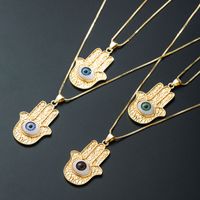 Nihaojewelry Wholesale Jewelry Hip Hop Devil's Eye Palm Pendant Copper Gold-plated Oil Dropping Necklace main image 1