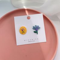 Nihaojewelry Großhandel Schmuck Einfache Asymmetrische Schlagfarbe Blumenohrstecker sku image 1
