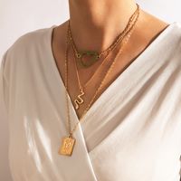 Nihaojewelry Bijoux En Gros De Mode Carré Papillon Vert Creux Coeur Serpent Pendentif Collier main image 1
