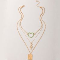 Nihaojewelry Großhandel Schmuck Mode Quadrat Schmetterling Grün Hohles Herz Schlange Anhänger Halskette main image 3