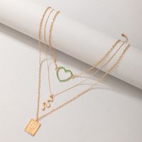 Nihaojewelry Großhandel Schmuck Mode Quadrat Schmetterling Grün Hohles Herz Schlange Anhänger Halskette main image 5