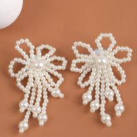 Nihaojewelry Wholesale Jewelry Simple Hand-woven Flower Pearl Earrings sku image 1
