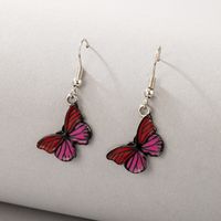 Al Por Mayor Pendientes Colgantes De Mariposa Roja De Moda Nihaojewelry sku image 1