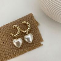 Wholesale Jewelry C-shaped Twist Circle Heart Pearl Earrings Nihaojewelry main image 1