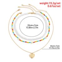 Wholesale Bijoux Pendentif En Forme De Coeur Fleurs Colorées Collier De Perles Imitation Tissé Ensemble Nihaojewelry main image 5