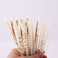 Wholesale Jewelry Simple Small Pearl Particles Hair Band Nihaojewelry main image 1