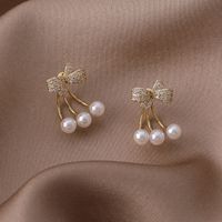 الجملة بسيطة مايكرو مطعمة الزركون Bowknot اللؤلؤ النحاس أقراط Nihaojewelry main image 4