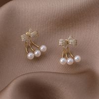 Vente En Gros Boucles D&#39;oreilles En Cuivre Perle Bowknot Zircon Micro-incrusté Nihaojewelry main image 4