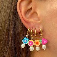 Wholesale Mixed Color Flower Pattern Pearl Stainless Steel Earrings Nihaojewelry main image 1