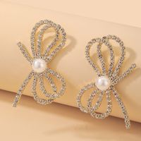 Wholesale Fashion Inlaid Rhinestone Pearl Bow Earrings Nihaojewelry main image 1