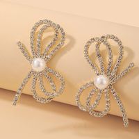 Wholesale Fashion Inlaid Rhinestone Pearl Bow Earrings Nihaojewelry main image 2