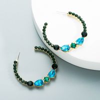Großhandel Modelegierung Eingelegte Farbe Strass C-förmige Ohrringe Nihaojewelry main image 3