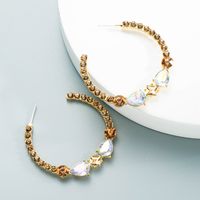 Großhandel Modelegierung Eingelegte Farbe Strass C-förmige Ohrringe Nihaojewelry main image 5