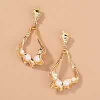 Nihaojewelry Jewelry Wholesale Fashion Hollow Metal Curved Pearl Earrings main image 3