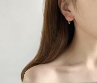 Nihaojewelry Bijoux En Gros Chaîne De Gland Coréen Boucles D'oreilles En Acier Titane Suspendues À L'arrière main image 4