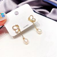 Nihaojewelry Koreanische Art Schmetterling Perle Quaste Kupfer Ohrringe Großhandel Schmuck main image 3