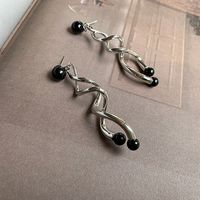 Nihaojewelry الجملة مجوهرات بسيطة هندسية الملتوية النحاس الأقراط الطويلة main image 5