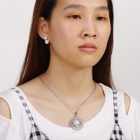 Fashion New Hollow Stainless Steel Round Pearl Necklace Earrings Set Wholesale Nihaojewelry main image 3
