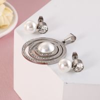 Fashion New Hollow Stainless Steel Round Pearl Necklace Earrings Set Wholesale Nihaojewelry main image 4