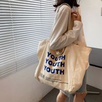 Simple Fashionable Letter Printed Canvas Large Capacity Tote Bag Wholesale Nihaojewelry main image 2