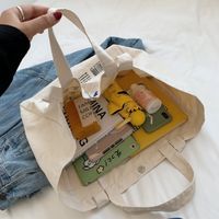 Simple Fashionable Letter Printed Canvas Large Capacity Tote Bag Wholesale Nihaojewelry main image 4