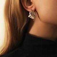 Metal Hollow Leaf Rhinestone Pearl Korean Style Earrings Wholesale Jewelry Nihaojewelry main image 1