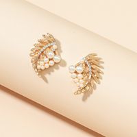 Metal Hollow Leaf Rhinestone Pearl Korean Style Earrings Wholesale Jewelry Nihaojewelry main image 4