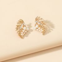 Metal Hollow Leaf Rhinestone Pearl Korean Style Earrings Wholesale Jewelry Nihaojewelry main image 5