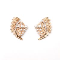 Metal Hollow Leaf Rhinestone Pearl Korean Style Earrings Wholesale Jewelry Nihaojewelry sku image 1