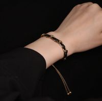 Großhandel Schmuck Hit Farbe Geflochtene Goldene Perlen Quaste Titanstahl Verstellbares Armband Nihaojewelry main image 4