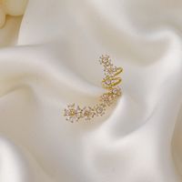 Vente En Gros Bijoux Incurvés En Cuivre Incrusté Fleur Zircon Oreille Os Clip Nihaojewelry sku image 1