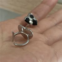 Wholesale Jewelry Black White Dripping Oil Heart-shaped Ear Clip Single Nihaojewelry main image 4