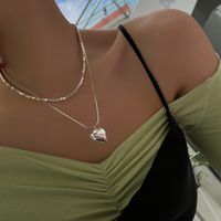 Einfaches Herz Spleißen Perle Schlangenknochen Gestapelte Kupferhalskette Großhandel Nihaojewelry main image 4