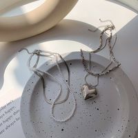 Einfaches Herz Spleißen Perle Schlangenknochen Gestapelte Kupferhalskette Großhandel Nihaojewelry main image 5