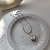 Einfaches Herz Spleißen Perle Schlangenknochen Gestapelte Kupferhalskette Großhandel Nihaojewelry sku image 1