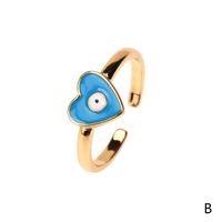 Adorno Ojo Del Diablo Cobre Gota Aceite Anillo De Las Mujeres Cruzado Nueva Llegada Europea Y Americana Internet Caliente Amor Corazón Hipster Moda sku image 2