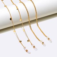Einfache Mode Zweiteilige Kupfer Twist Herz Gold Brille Kette Großhandel Nihaojewelry sku image 1
