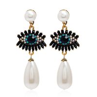 European And American Fashion Retro Bohemian Exaggerated Pearl Earrings Special Simple Creative Exaggerated Eyes Long Earrings sku image 1