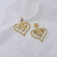 Baroque Retro Hollow Pearl Twist Heart Earrings Wholesale Nihaojewelry main image 3