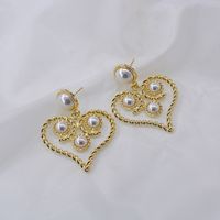 Baroque Retro Hollow Pearl Twist Heart Earrings Wholesale Nihaojewelry main image 4
