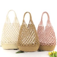 Retro Hollow Straw Woven Solid Color Bucket Bag Wholesale Nihaojewelry main image 6