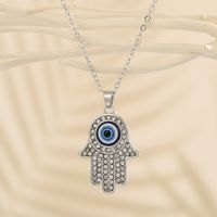 New Turkey Demon Eye Diamond Palm Pendant Necklace Wholesale Nihaojewelry main image 4