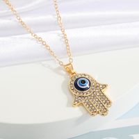 Neue Türkei Dämon Auge Diamant Palm Anhänger Halskette Großhandel Nihao Schmuck main image 5