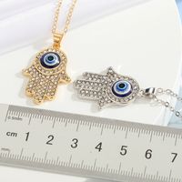 New Turkey Demon Eye Diamond Palm Pendant Necklace Wholesale Nihaojewelry main image 6