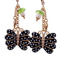 Pendientes De Diamantes Retro Europeos Y Americanos Diseño De Punto De Personalidad De Mariposa Tachuelas Internet Celebridad Mismo Estilo Estilo Frío Pendientes De Moda main image 6