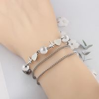 Bracelets D&#39;étiquette De Verrouillage De Chaîne De Forme De Coeur De Mode D&#39;acier Au Titane En Gros Nihaojewelry sku image 6